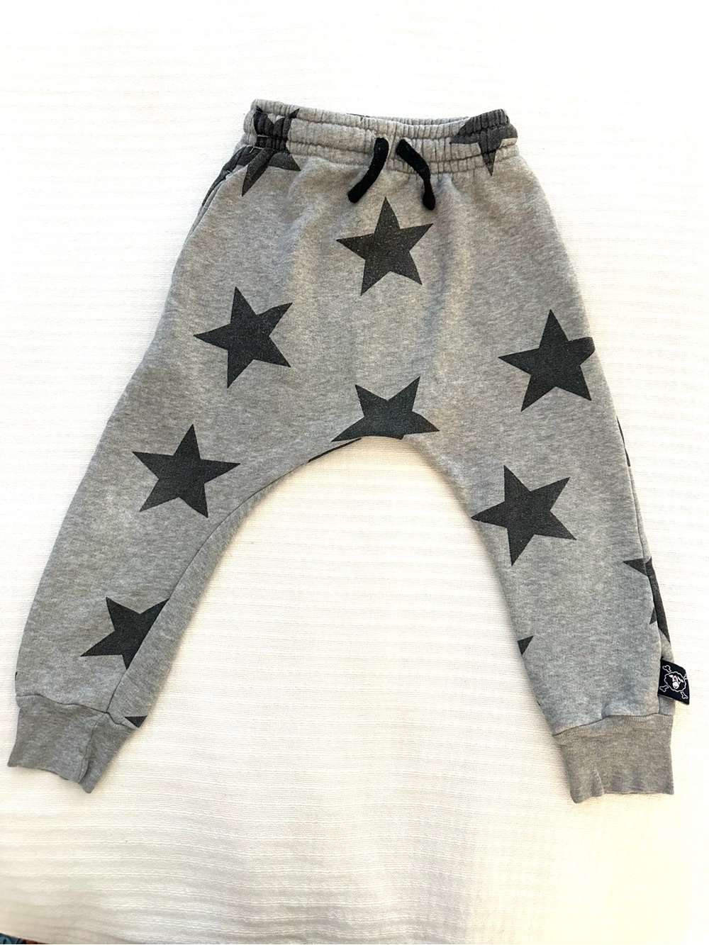 Nununu Kids Grey Joggers with Black Star Pattern